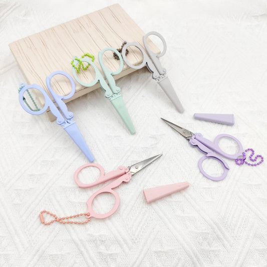 Portable folding scissors with sheath