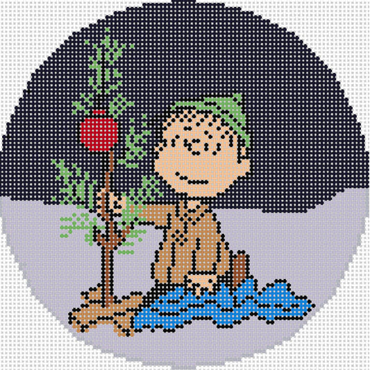 PEANUTS "A Charlie Brown Christmas" - Linus Kneeling wrapping blanket around tiny tree round